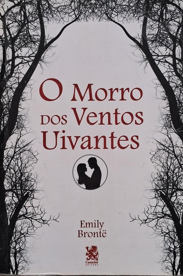 Book cover for 'O Morro dos Ventos Uivantes' by Emily Brontë, Portuguese edition with silhouetted lovers illustration and bare tree borders.